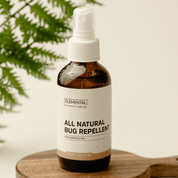 All Natural Bug Repellent spray with essential oils in an amber glass bottle. Provides natural protection against insects, perfect for outdoor use.